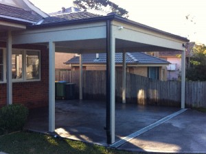 Hipped Tiled Carport with Coloured Concrete